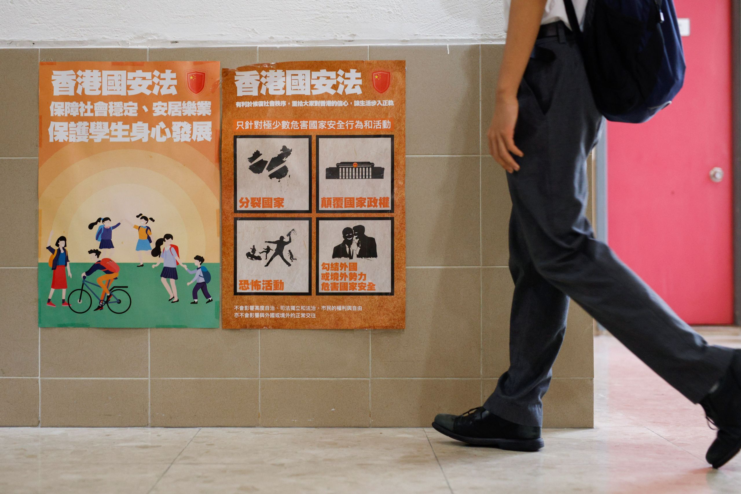 Posters on the National Security law are put up at a secondary school. 