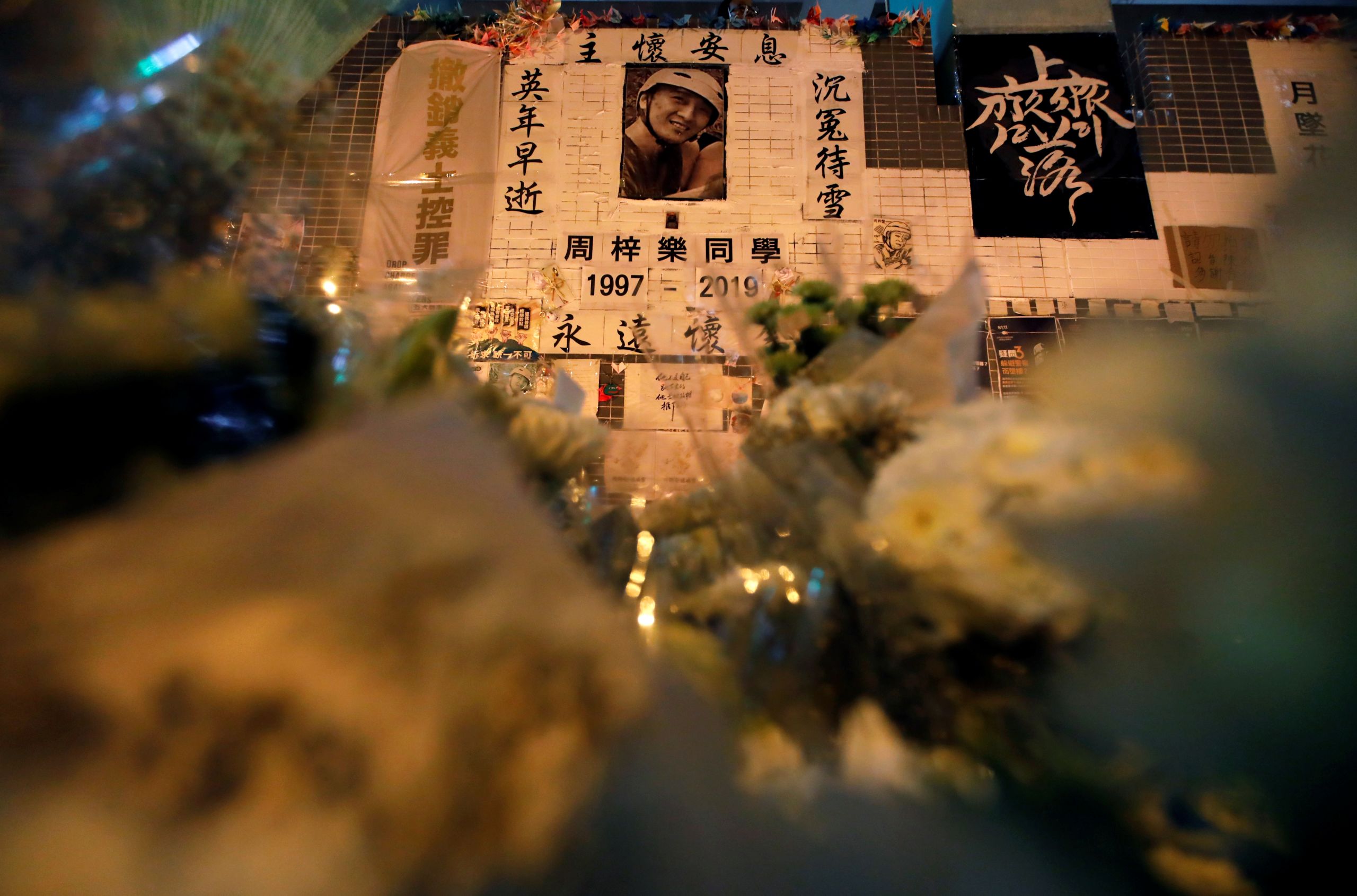 2020年11月4日，香港科技大学学生周梓乐在反修例运动时的警民冲突中坠楼。（图：REUTERS）