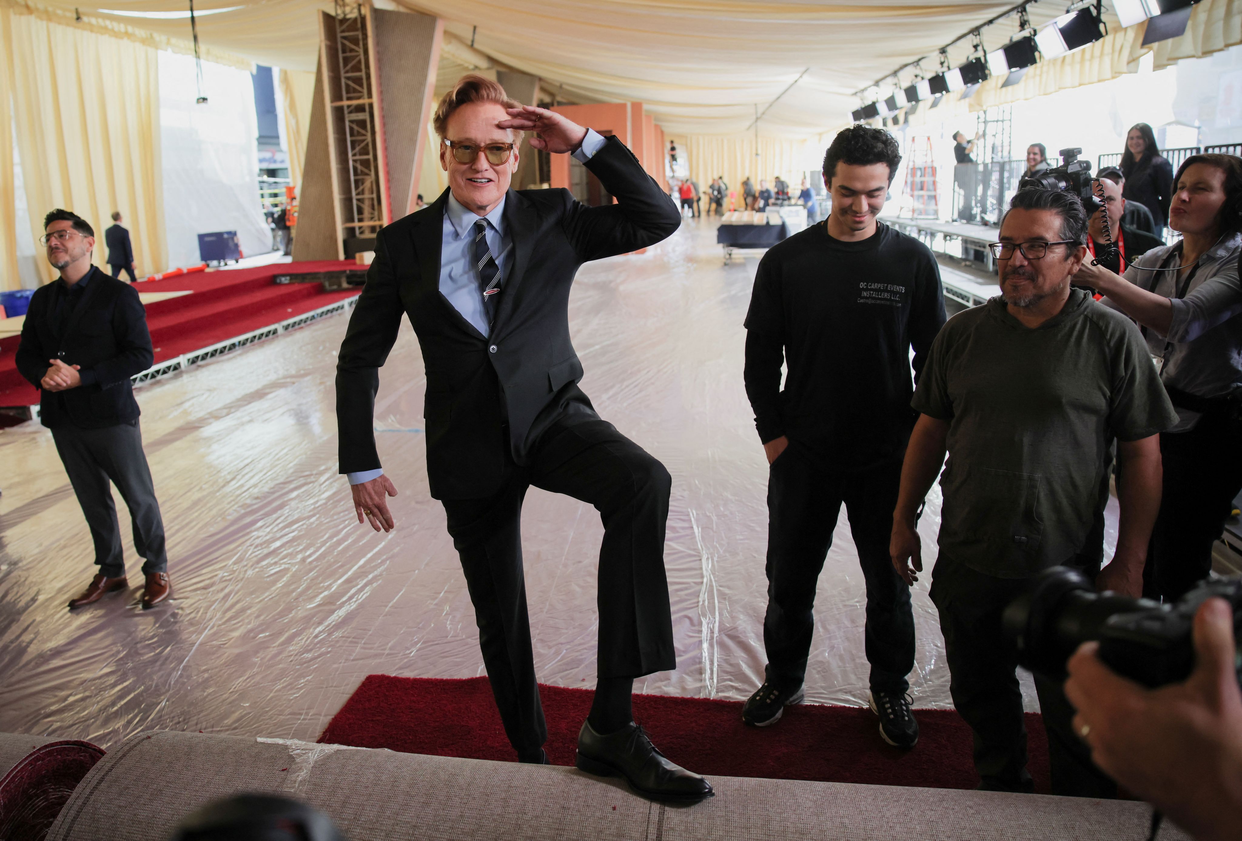 The sun is shining through the trees in the forest