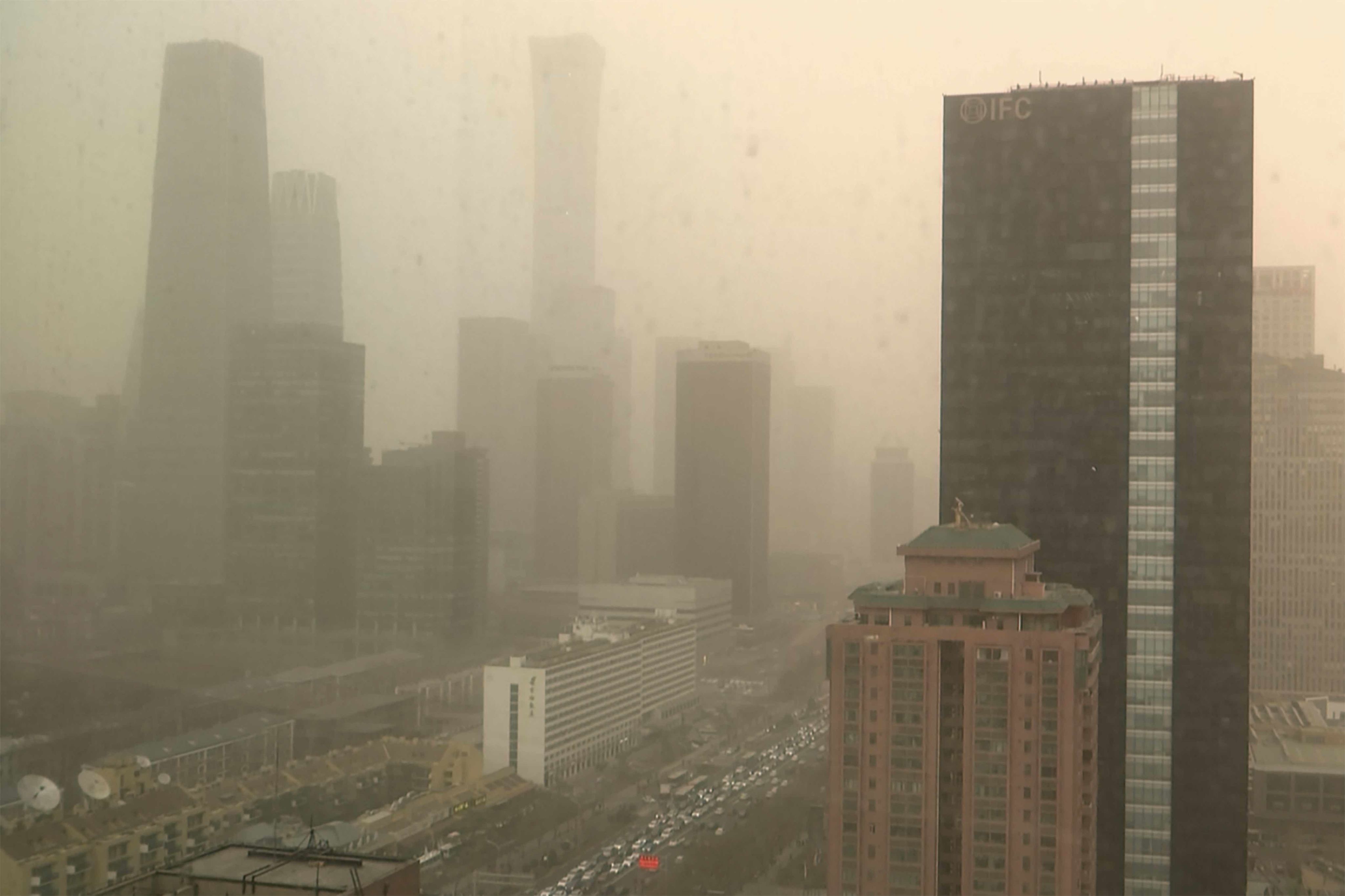 Hazy skies in Beijing as air quality plummeted from a dust storm and heavy pollution on Mar 10, 2023. (AP / Borg Wong)