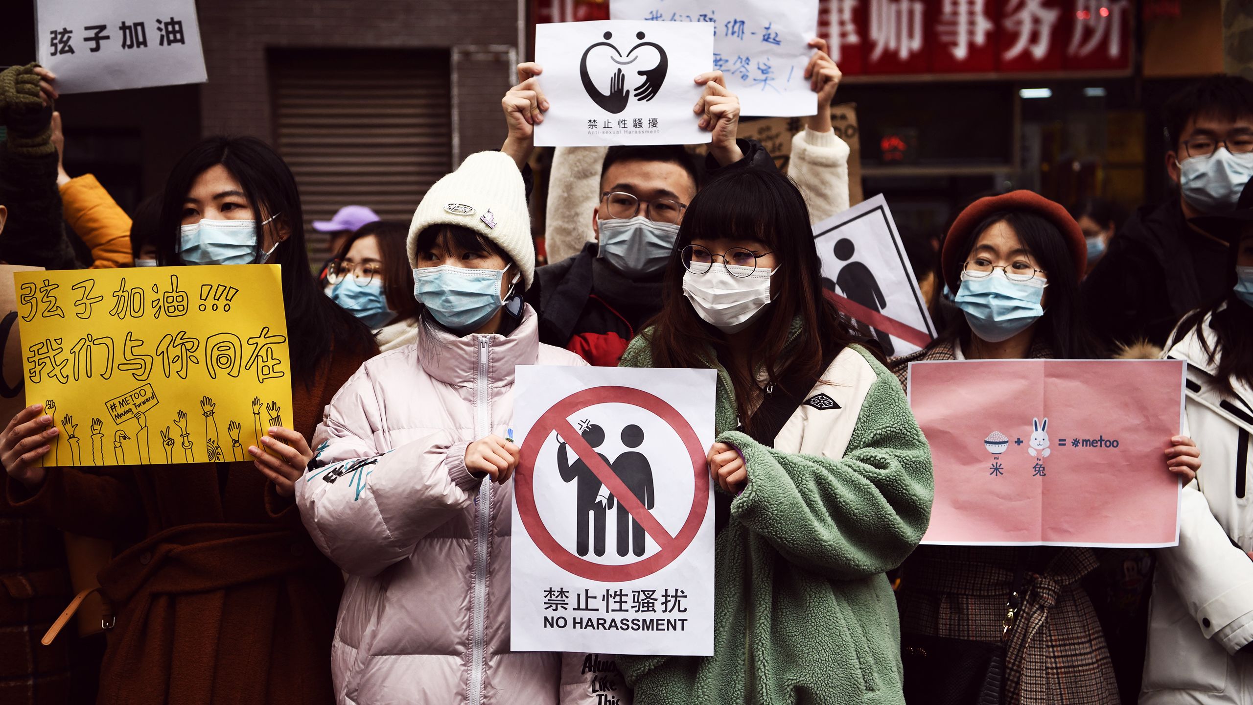 Xianzi's supporters wait outside the court. (Source: AFP)